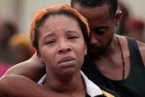 Aug 9, 2014 - Ferguson, Missouri, U.S. - LESLEY MCSPADDEN is comforted by her husband, Louis Head, hours after the fatal police shooting of her son Michael Brown in the Canfield Green Apartments. (Credit Image: © Huy Mach/St Louis Post-Dispatch/ZUMAPRESS.com)